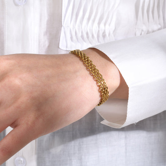 "GoldWeave: Luxe Mesh Bracelet"